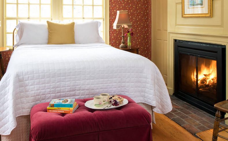 Bourne Room bed and fireplace