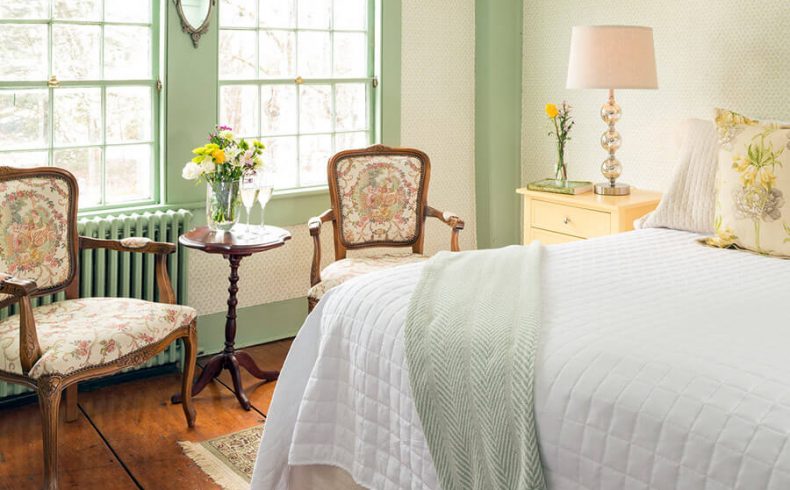 Lyman Room bed and sitting area at our Kennebunkport B&B