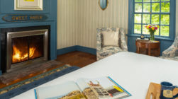 Sweet Haven Room bed, chairs and fireplace at our Kennebunkport, Maine B&B