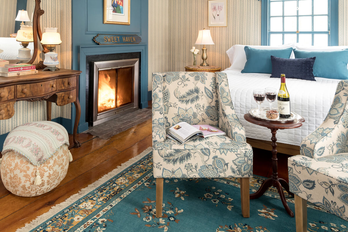 Cozy accommodations at Waldo Emerson Inn, room with a fireplace